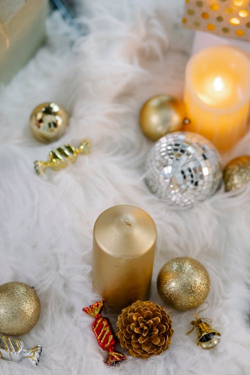Christmas composition with baubles and candles