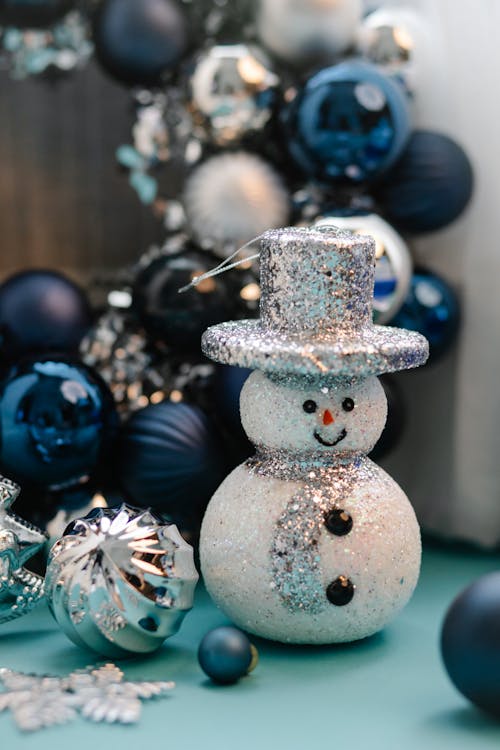 Free Snowman and Christmas decorations in room Stock Photo