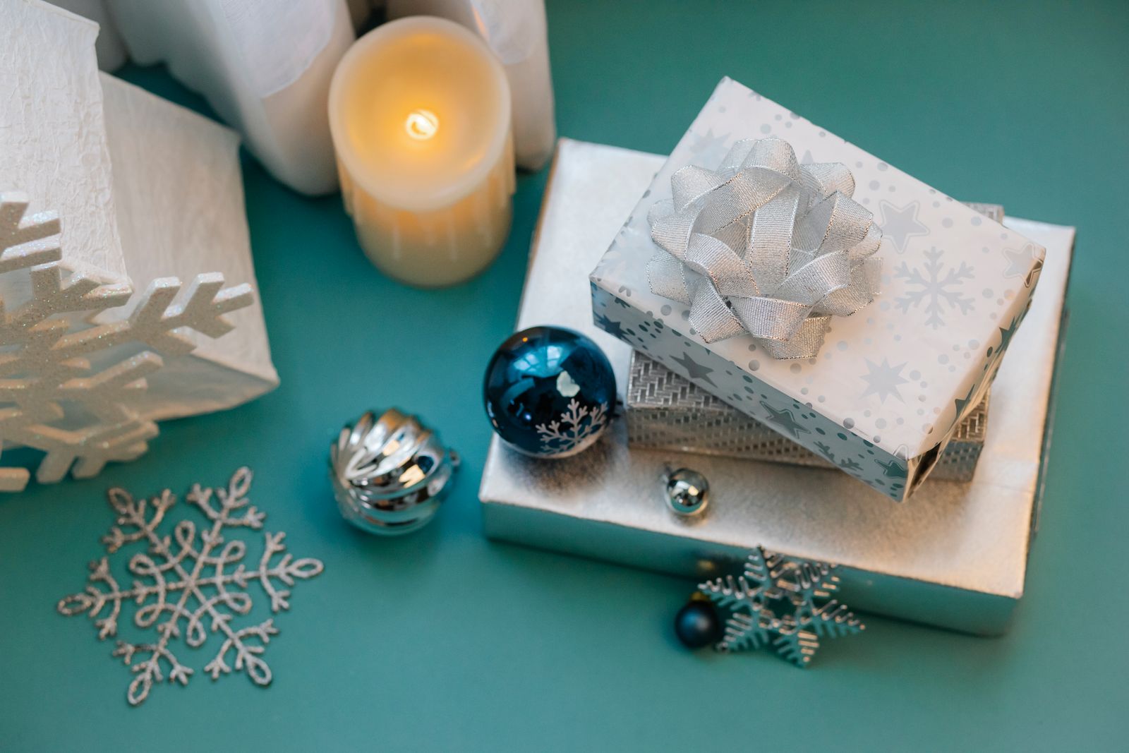 Holiday gift boxes and Christmas decorations arranged together