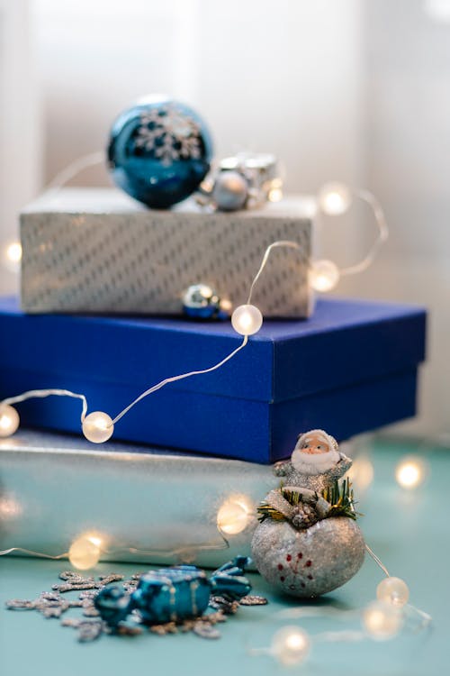 Bright glowing fairy lights and gift boxes