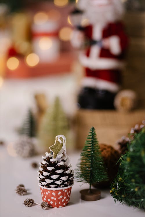 Free Decorative cone and small Christmas trees Stock Photo