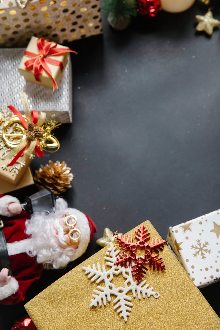 Decorative Objects For Christmas On Black Table In Bright Room