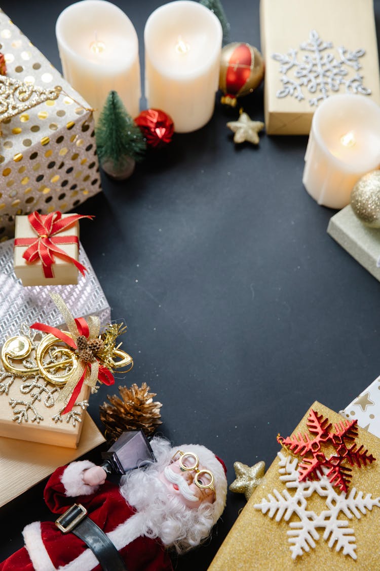 Decorative Objects For Christmas In Bright Room On Black Table