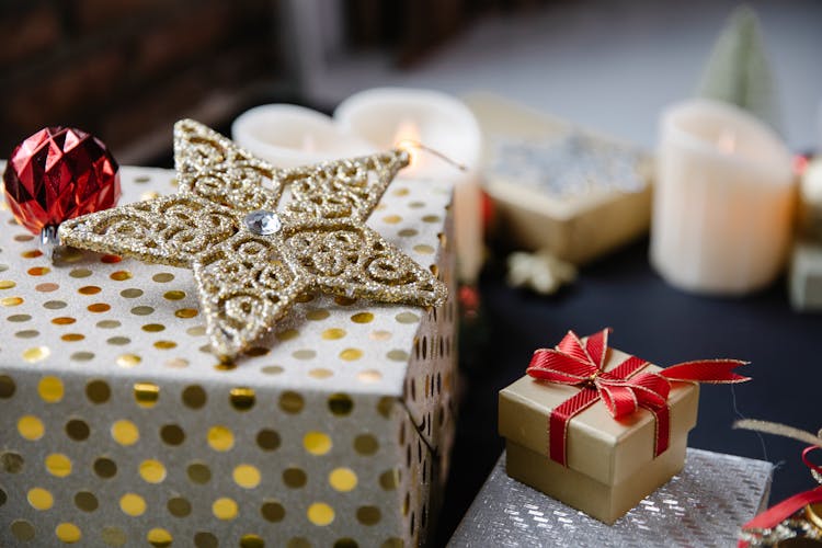 Decorative Objects For Christmas On Black Surface