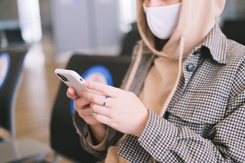 Close-Up Shot of a Person Using a Smartphone