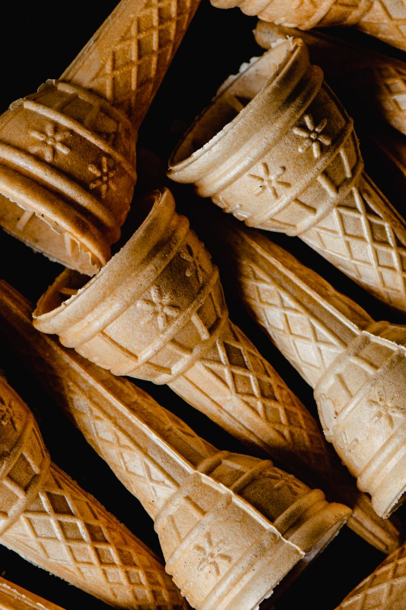 Plain ice cream cones stacked closely together