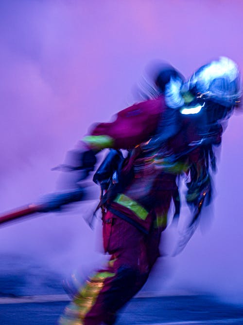 
A Firefighter Holding a Hose