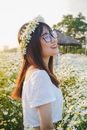 Woman in White Shirt Wearing Black Sunglasses