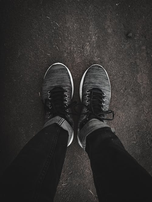 Crop person in stylish sneakers · Free Stock Photo