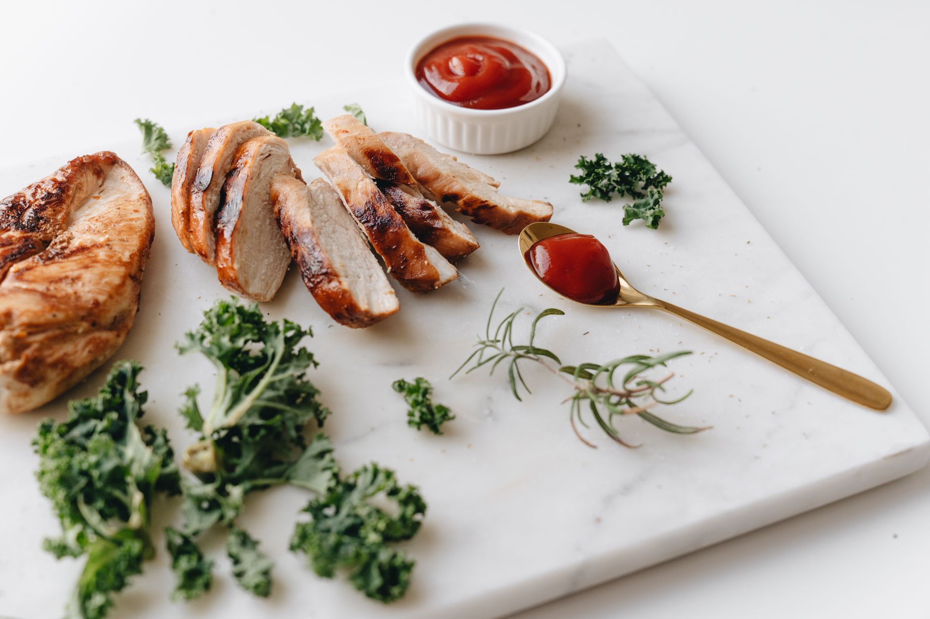Creamy mushroom sauce spooned over keto chicken breast