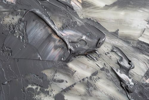 Free Close-up view of abstract gray paint texture creating a striking pattern. Stock Photo