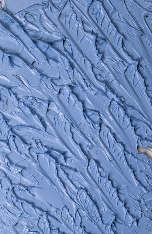 Free High-detail vertical shot of vibrant blue abstract paint texture with unique patterns. Stock Photo