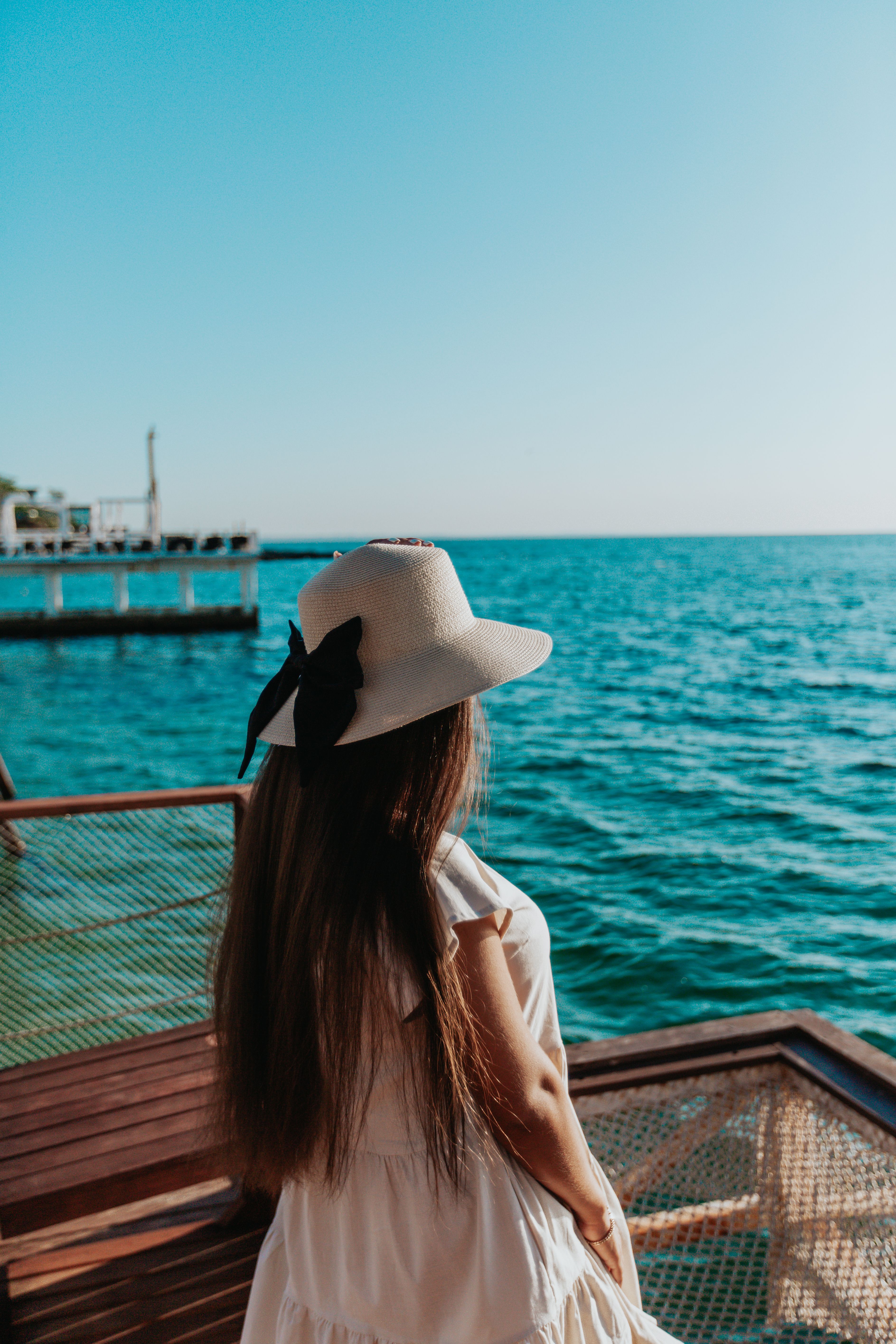 Feminine woman resting on seafront during summer holidays · Free Stock ...