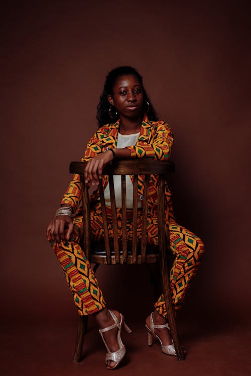 Free A Woman Wearing a Tribal Print Blazer and Pants Stock Photo