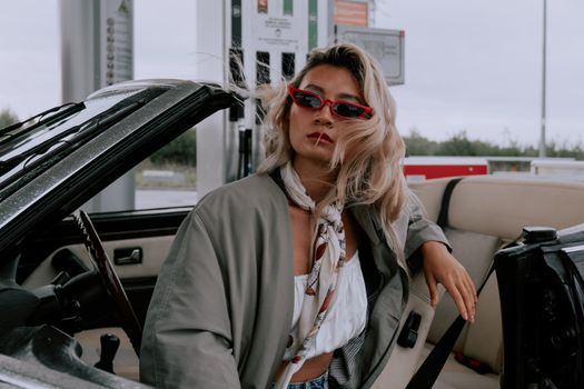 A Beautiful Woman in a Cabriolet 