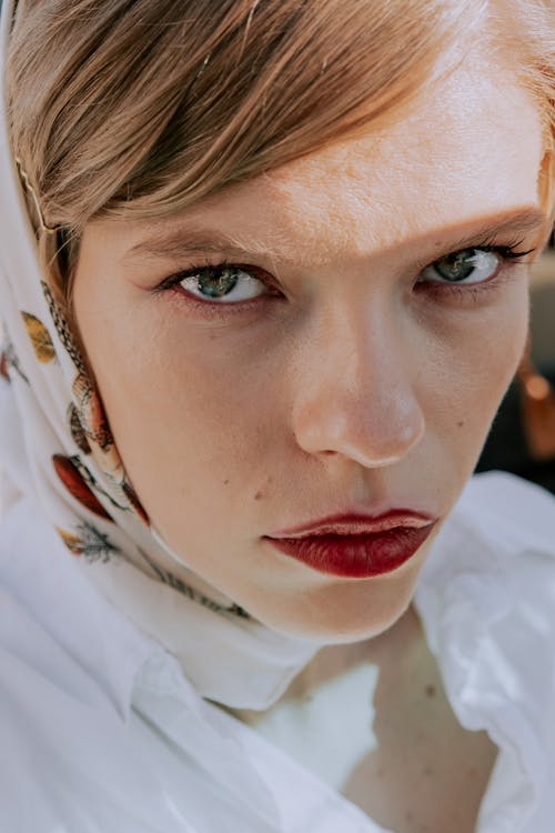 Woman in White and Red Head Scarf