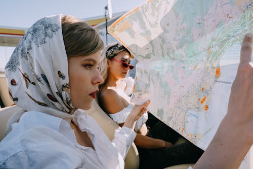 A Beautiful Woman Looking at a Map