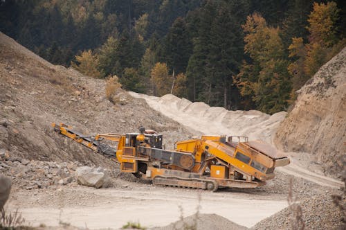 Free Industrial crusher machine in quarry Stock Photo