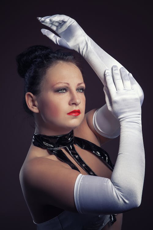 A Woman Wearing Satin Gloves