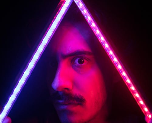 Mans Face With Pink Light