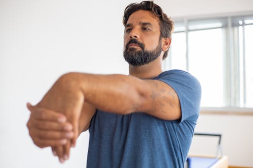 Free A Man doing Stretching  Stock Photo