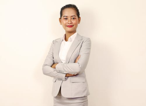 A Standing Woman in Business Attire 