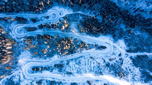 A Zigzag Road Covered in Snow