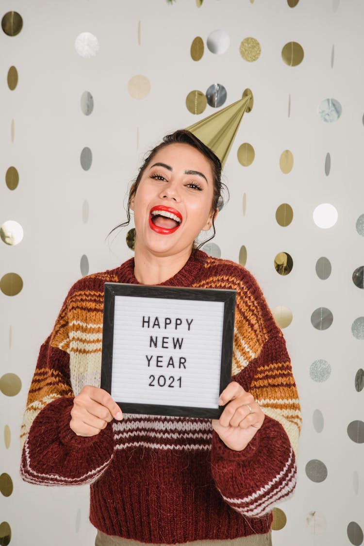 Cheerful Woman With Holiday Lettering