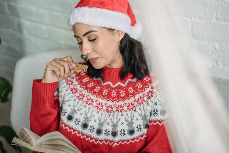 Woman With Book On Christmas Holidays