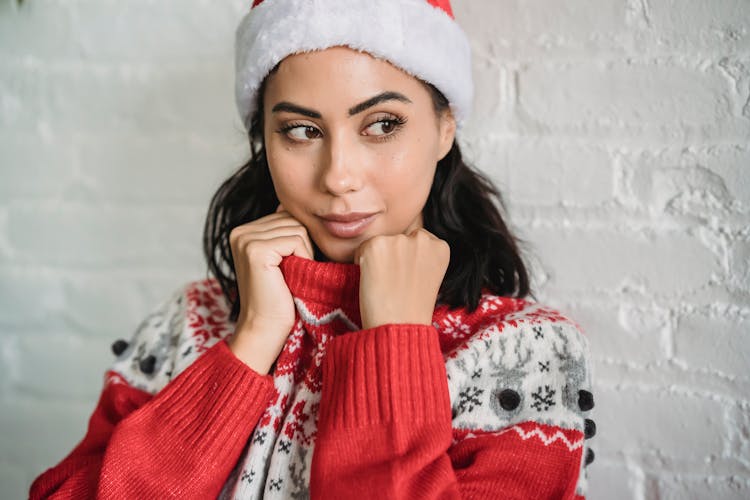 Charming Ethnic Female In Warm Soft Sweater At Christmas Holiday