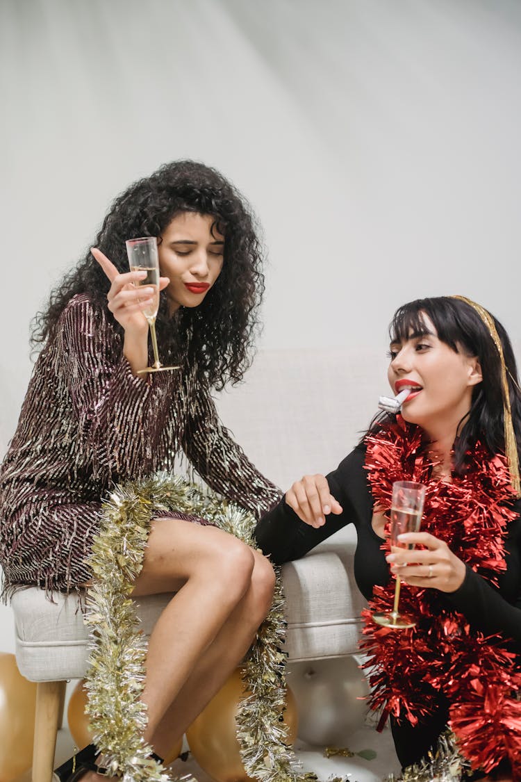 Drunk Female In Dress Celebrating New Year With Friend