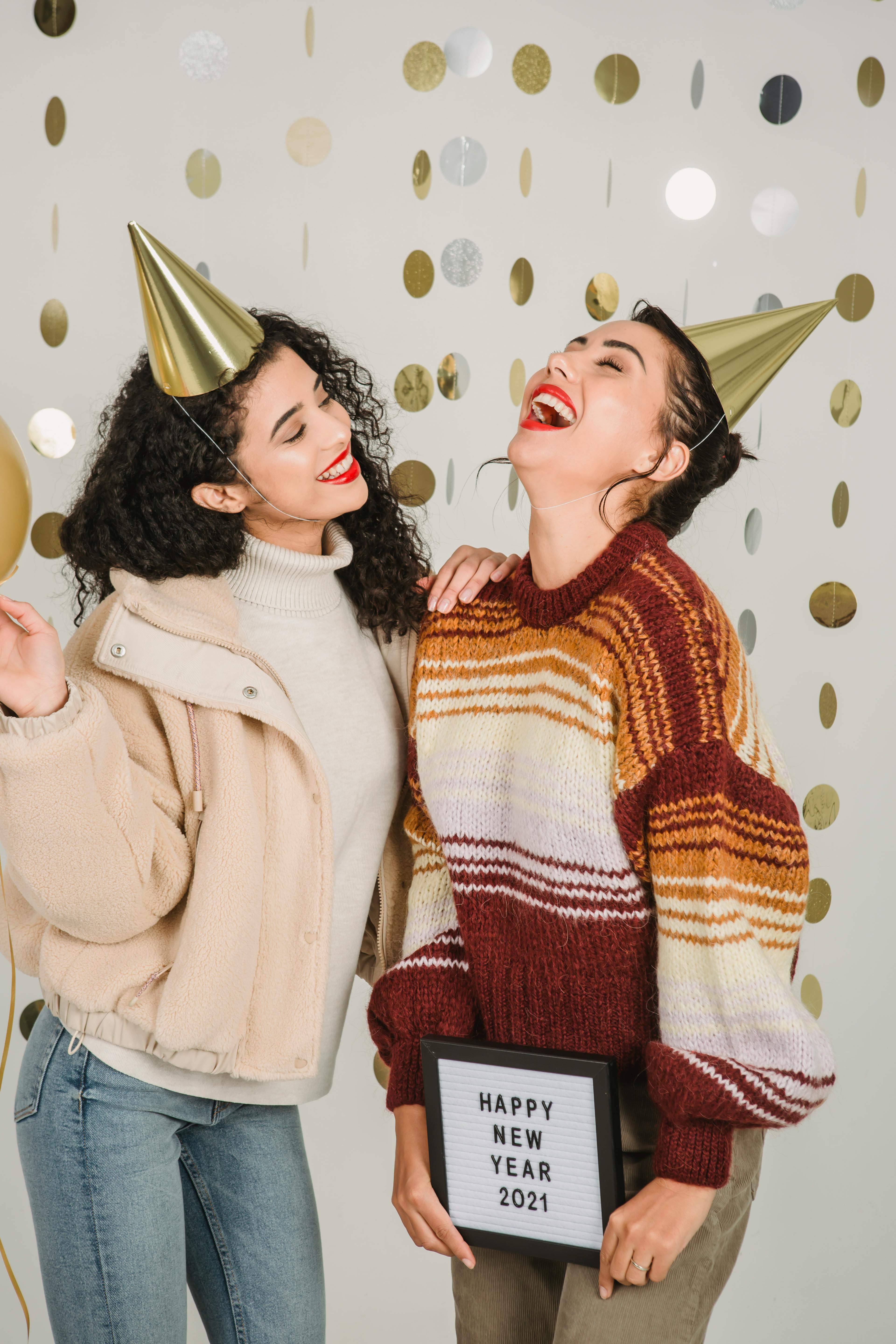 laughing females enjoying new year celebration