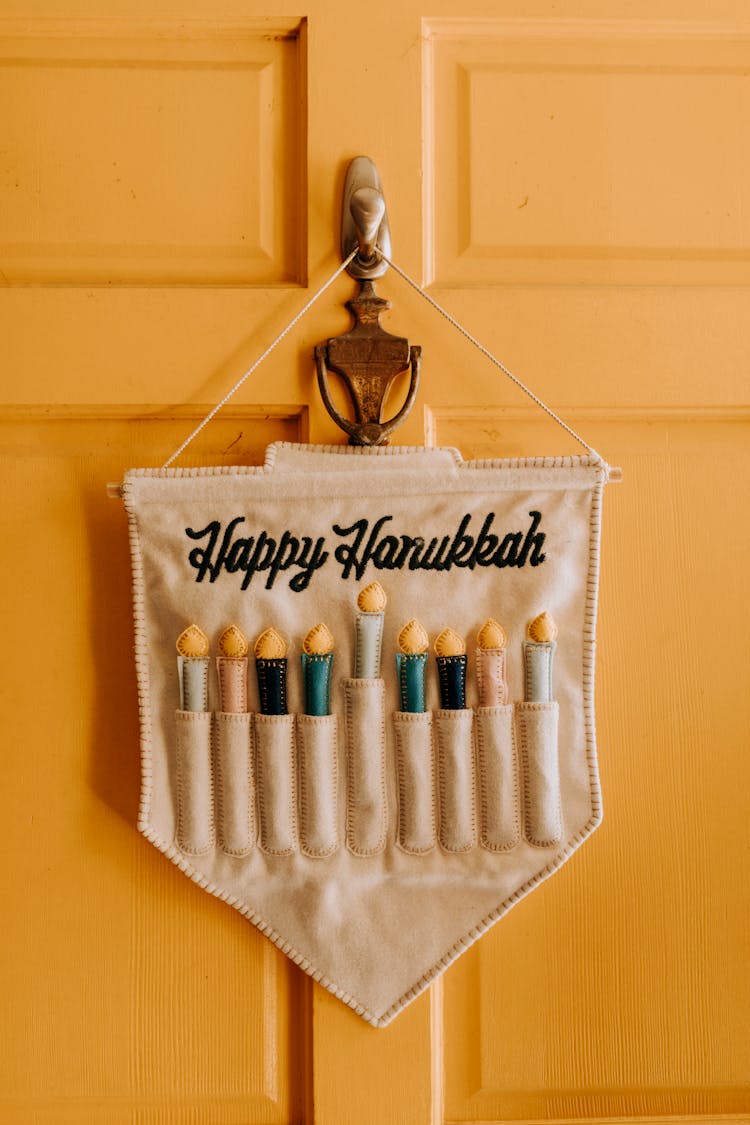 Close-Up Photo Of Happy Hanukkah Front Door Decor