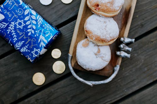 Photo Of Doughnuts On Top Of Wooden Table