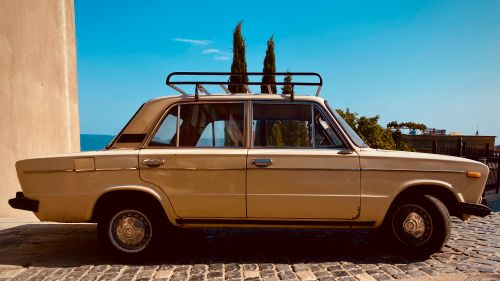 Free Classic Lada 1500 car with roof rack in outdoor setting. Stock Photo