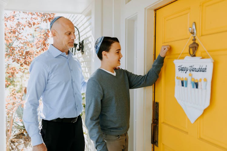 Photo Of Boy Knocking On Front Door