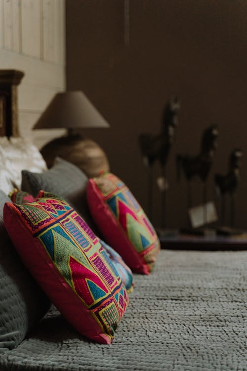 Pink Throw Pillows on a Bed