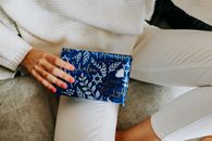 Photo Of Gift On Top Of Person's Thighs