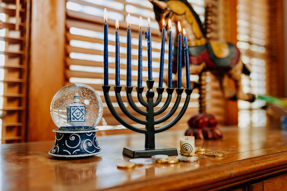 Photo Of Candle Holder On Top Of Wooden Table