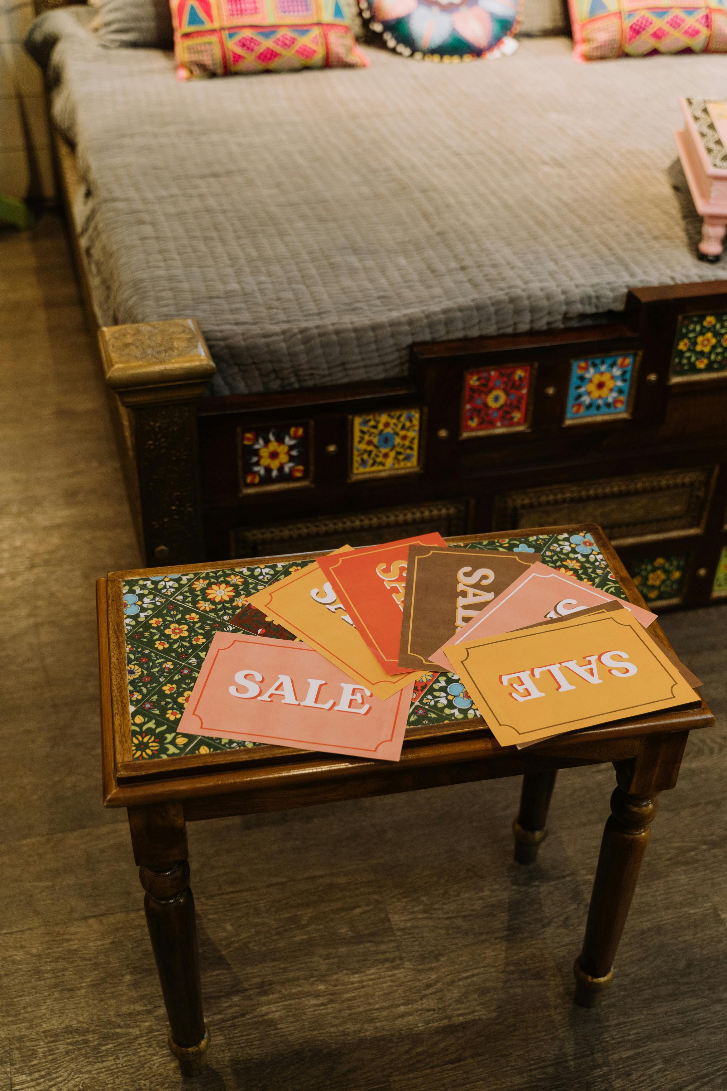 sale signs on a wooden bench