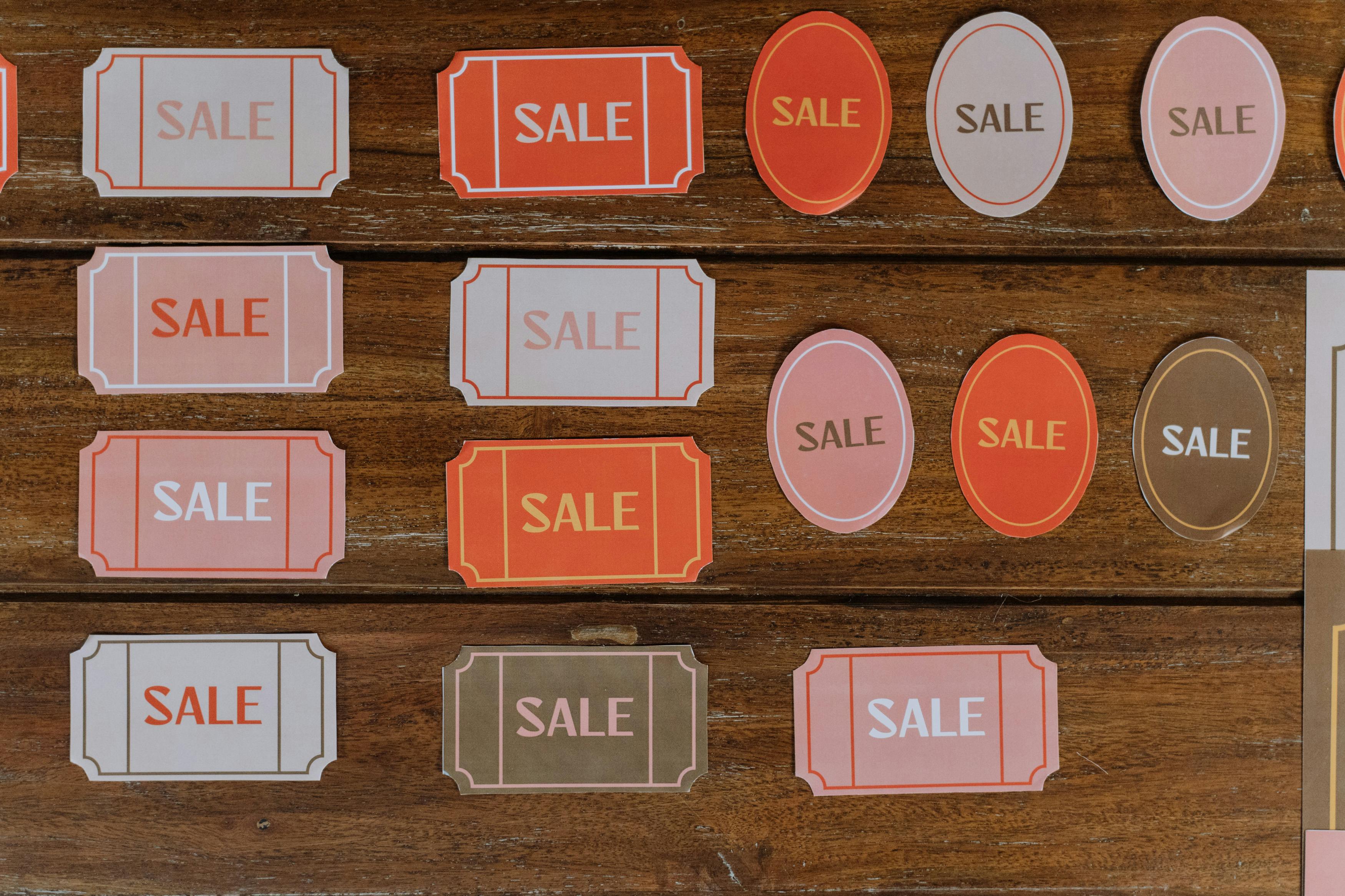 sale tags lying on woods