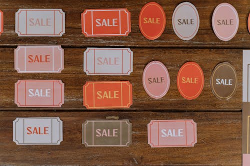 Free Sale Tags  Lying on Woods Stock Photo
