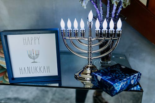 Photo Of Candle Holder On Top Of Glass Table