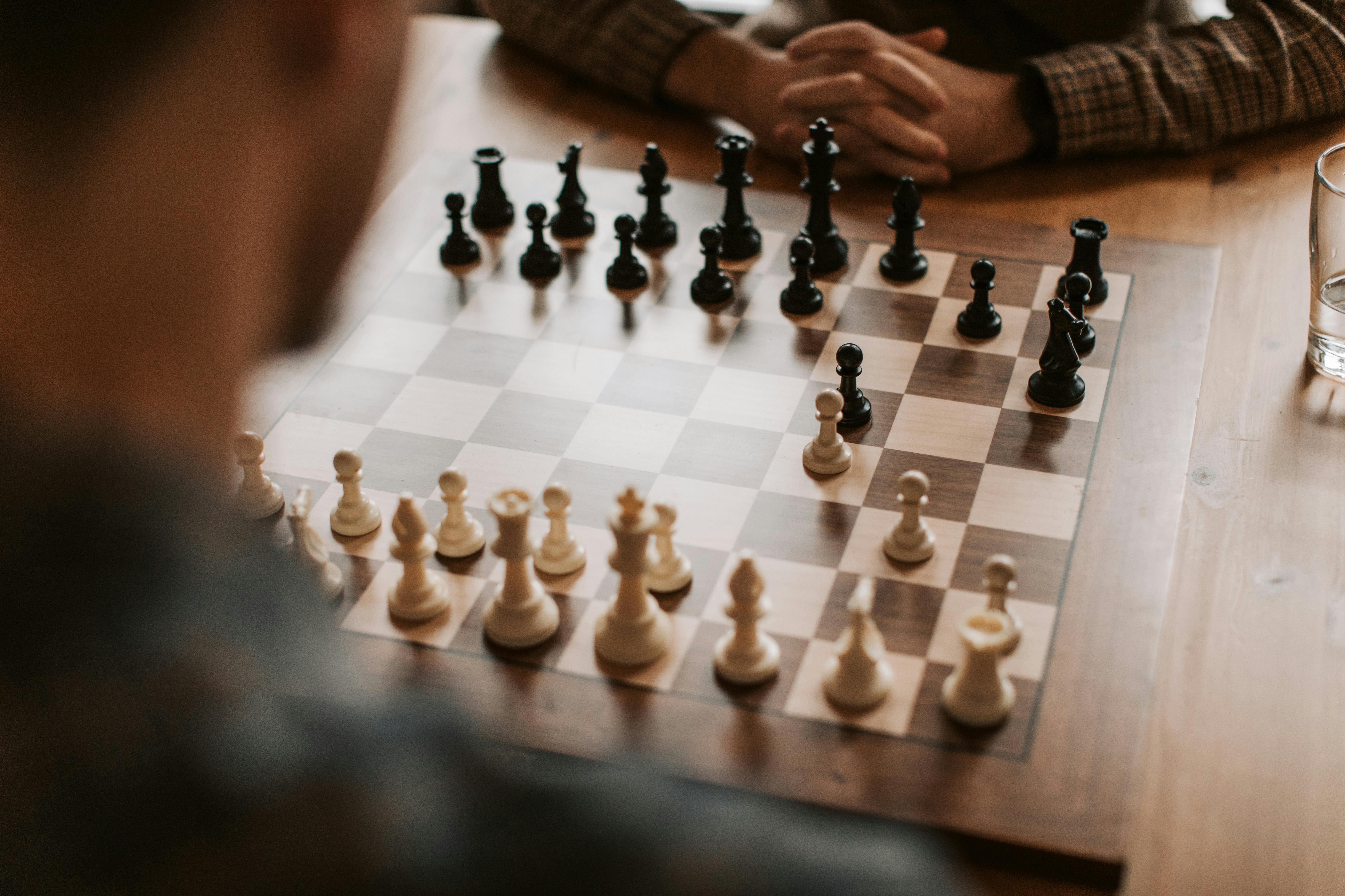 Chess, chess pieces, compass Stock Photo - Alamy