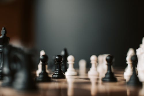 Free Chess Pieces in a Chessboard Stock Photo