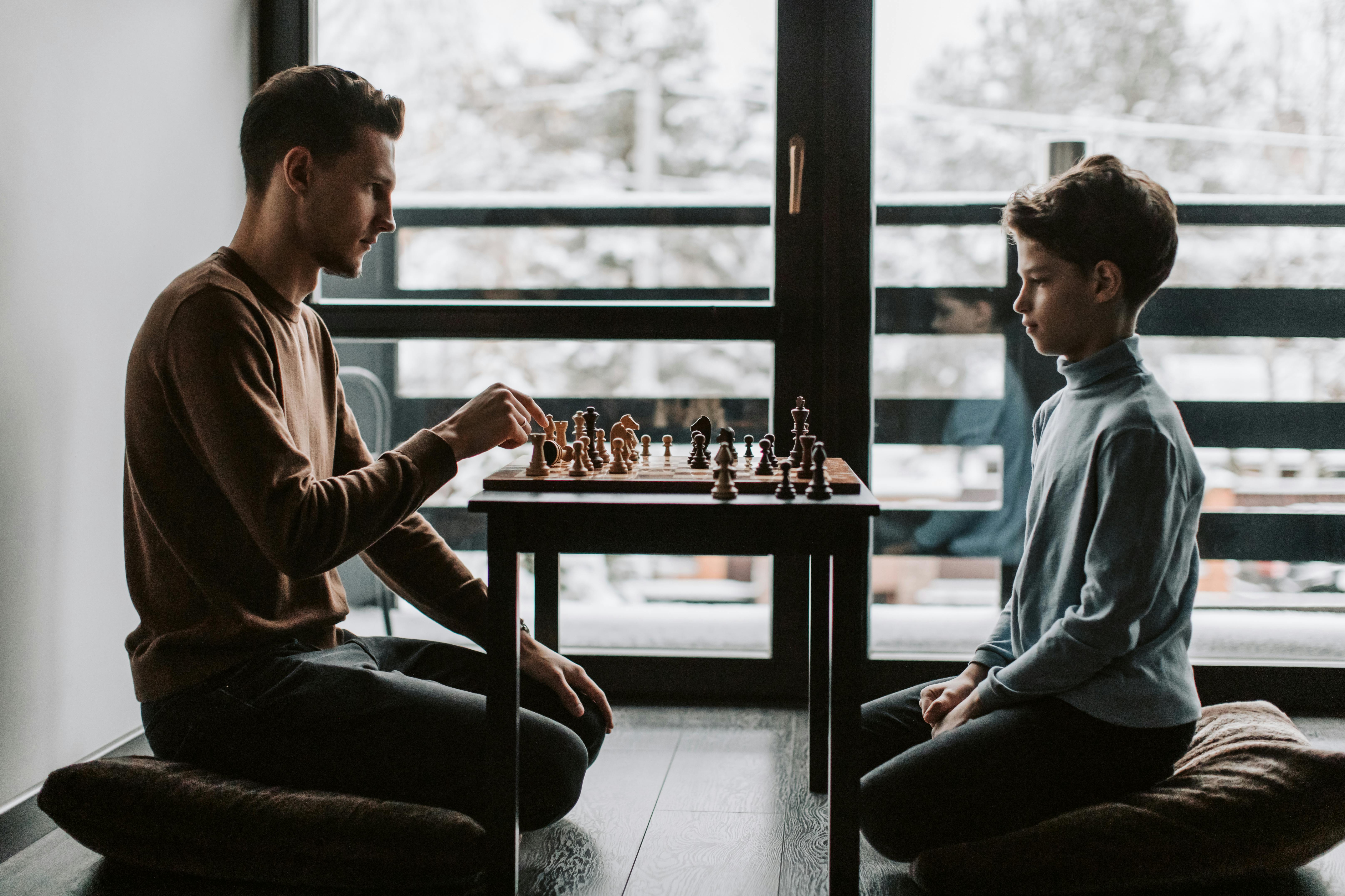 Chess Players. Two Men Play A Chess Stock Photo, Picture and Royalty Free  Image. Image 7563168.