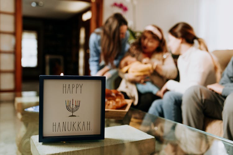 Photo Of Family Gathered Indoors