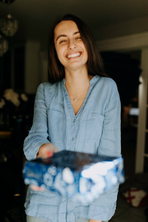 Photo Of Woman Holdinng A Gift 