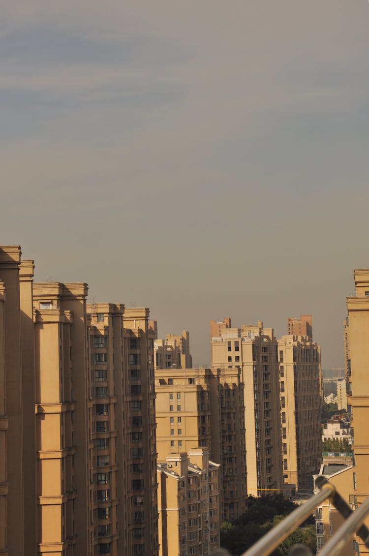 A Row Of High Concrete Buildings