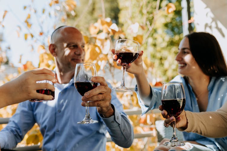 Photo Of Family Having Wine